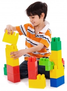 kid playing with blocks